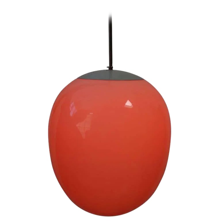 1960s Modern Egg Pendant Light: There's nothing sweeter than the simplicity of this egg form pendant! Being the lover of color that I am I added an orange bulb to the mix. But if you prefer it quieter have a look at the last image