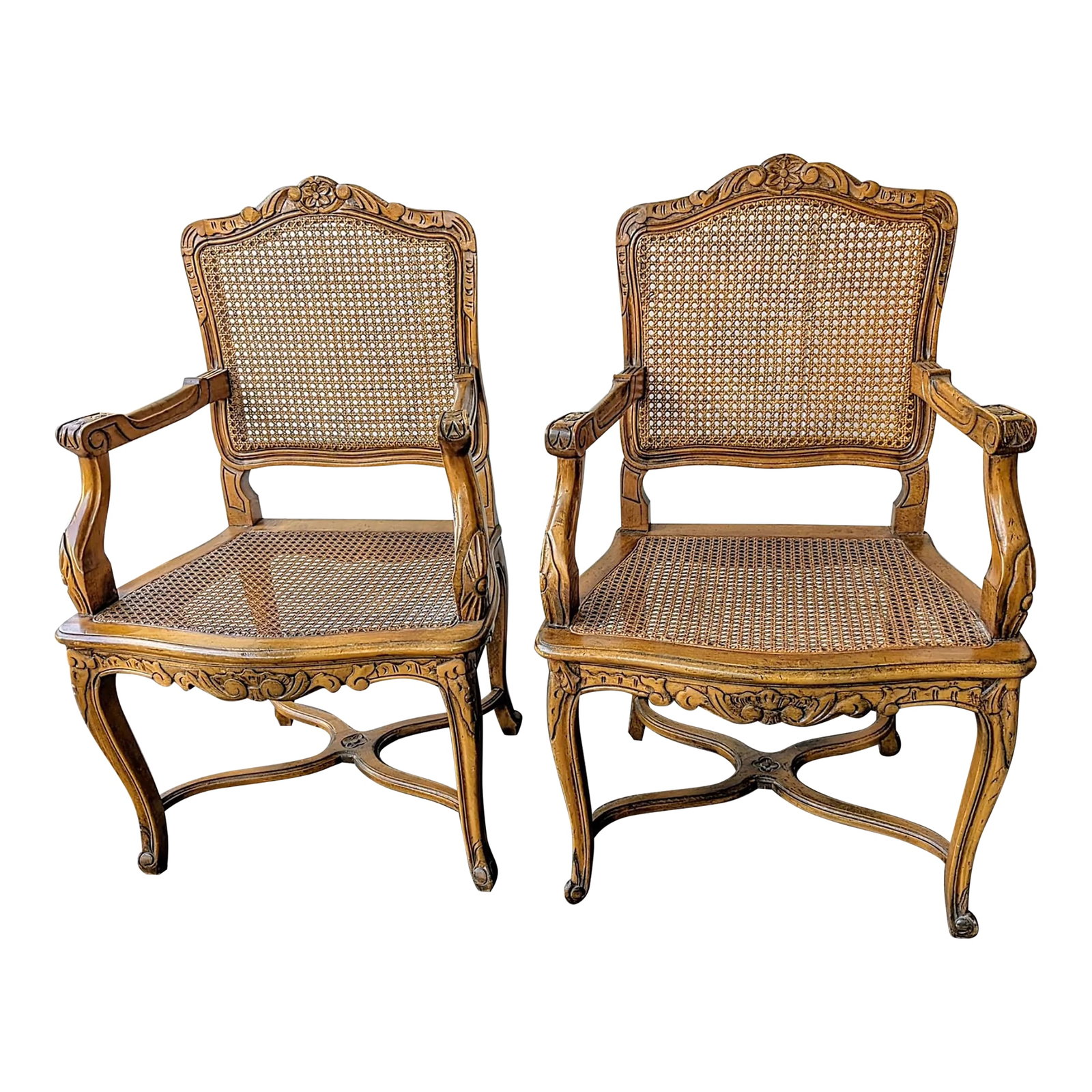 Pair of 20th Century French Louis XV Carved Walnut and Cane Armchairs: CORRECTION TO SHIPPING TIME, THIS IS SELLER SHIPPING, ARRIVAL TIME IS 4-10 DAYS FROM PURCHASE DATE. Mid century reproduction of early 20th Century French Louis XV carved walnut and cane armchairs. The