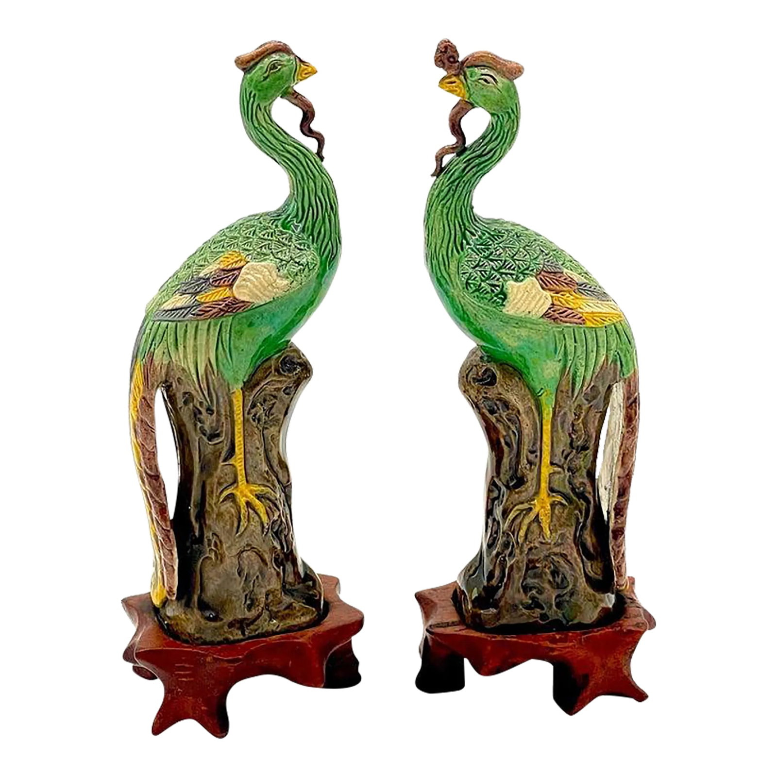 Early 20th Century Chinese Sancai Glazed Phoenix Birds, on Hardwood Stands - a Pair: A Diminutive Pair of Chinese Sancai Glazed Phoenix Birds, on Hardwood Stands China, 20th Century A Diminutive pair of Chinese sancai glazed phoenix birds, well presented on carved hardwood stands.