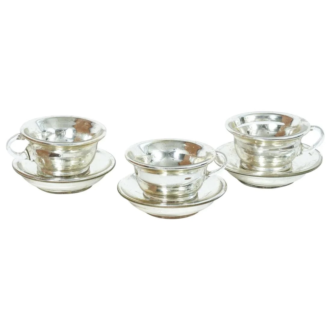 Mercury Glass Cups And Saucers - Service for 3: Three (3) mercury glass cups and saucers. Probably New England Glass Company. Will sell separately. Dimensions are for cup and saucer together. Condition: Alterations: Original Condition Unaltered