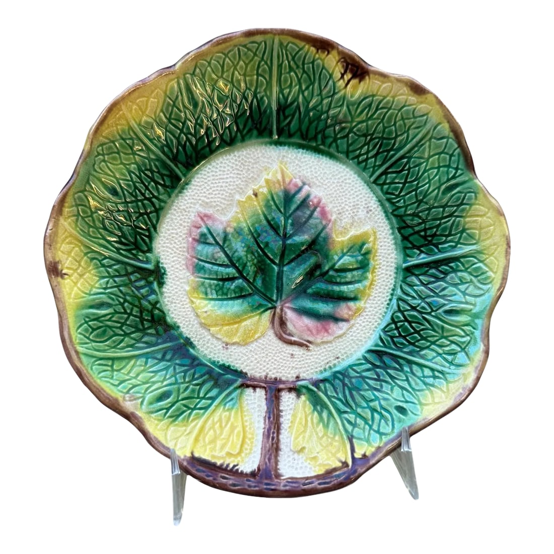 Majolica Antique 19th Century Grape Leaf Plate: Offering an antique late 19th century majolica hand painted pottery small shallow bowl, or deep plate measuring 7" in diameter and approximately 1.375" deep. Attributed to Joseph Mayer of Arsenal Pott