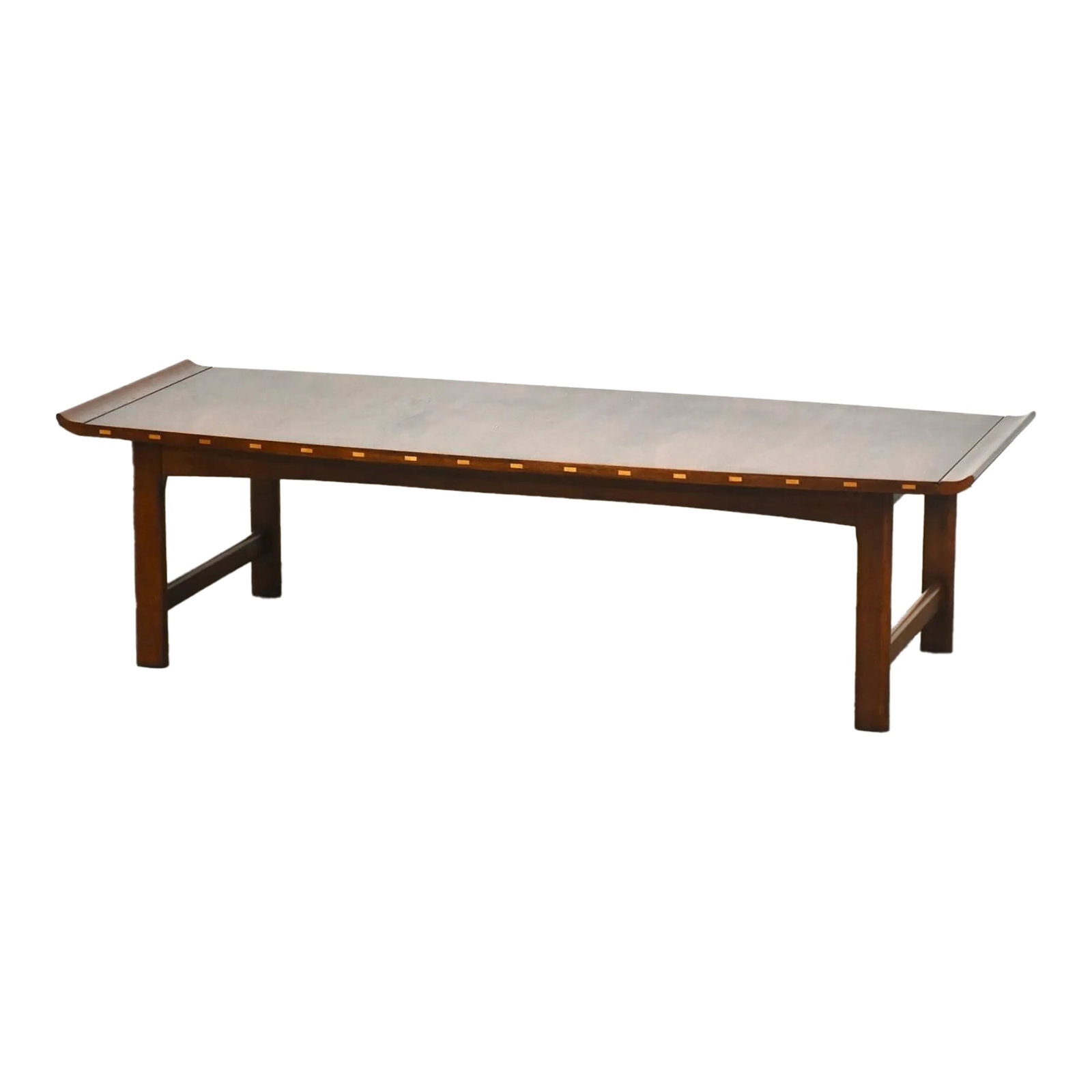1960s Walnut Coffee Table by Lane Furniture: A mid century modern walnut coffee table with lipped ends made by Lane Furniture. Professionally refinished. 56.25" wide. 22" deep. 15.125" tall. Condition: Alterations: Restored Imperfections: Some