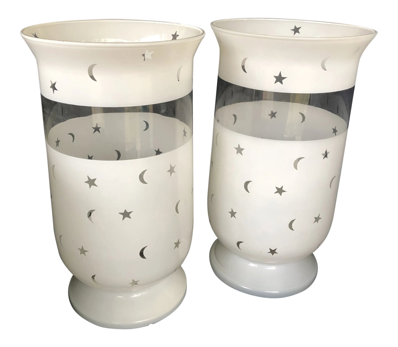 Moon & Stars Decorated Large Scale Frosted Glass Hurricane Shades - A Pair: Handsome large scale pair of frosted glass candle holders or hurricane shades decorated with moon and stars. Modern. Minor wear and a few abrasions otherwise in excellent shape. Solid bottoms to
