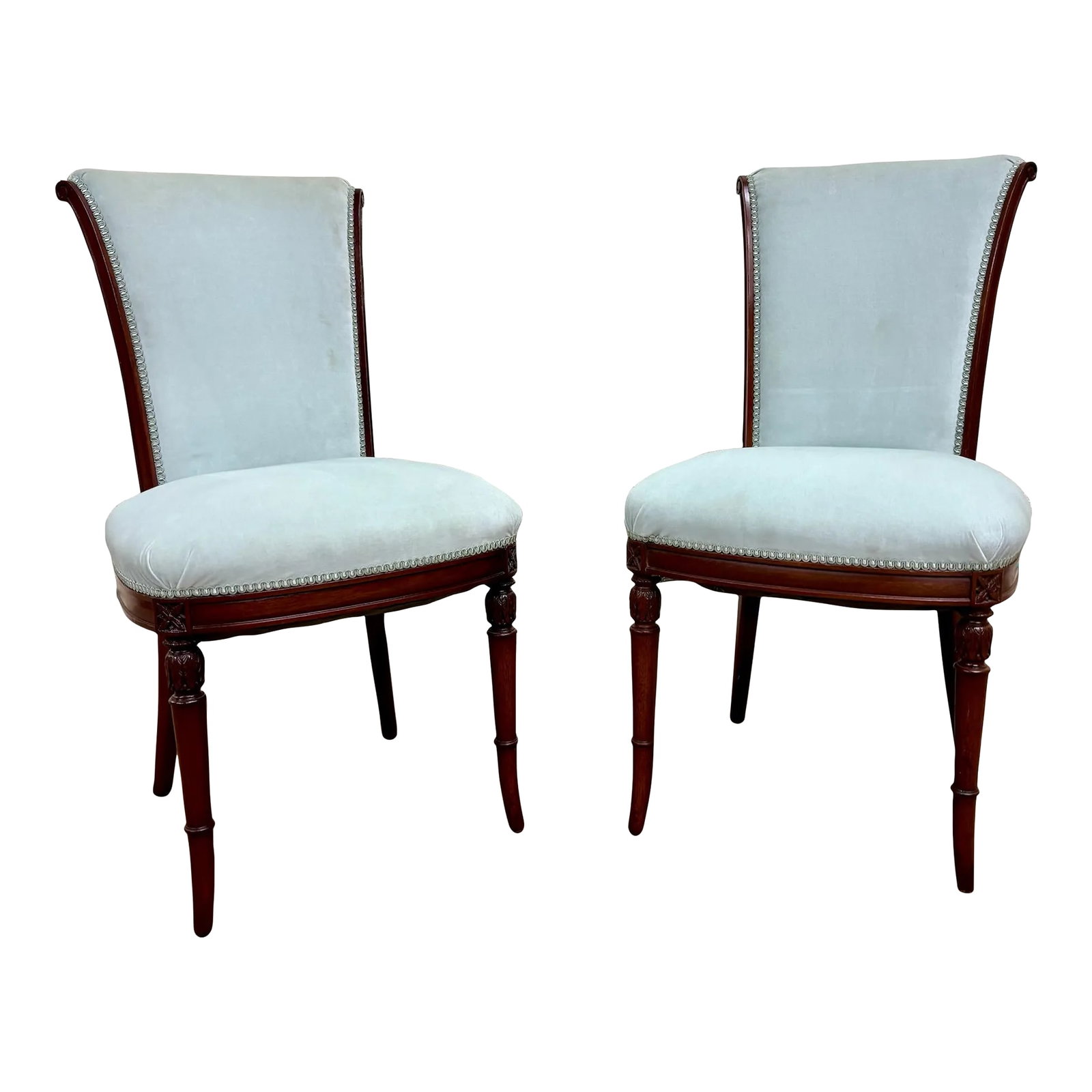 Antique French Louis XVI Style Blue Velvet Upholstered Dining Chairs: This is a stunning pair of antique French Louis XVI style dining chairs with blue velvet upholstery, believed to be from the late 19th century. Features blue velvet upholstery, carved flower squares,