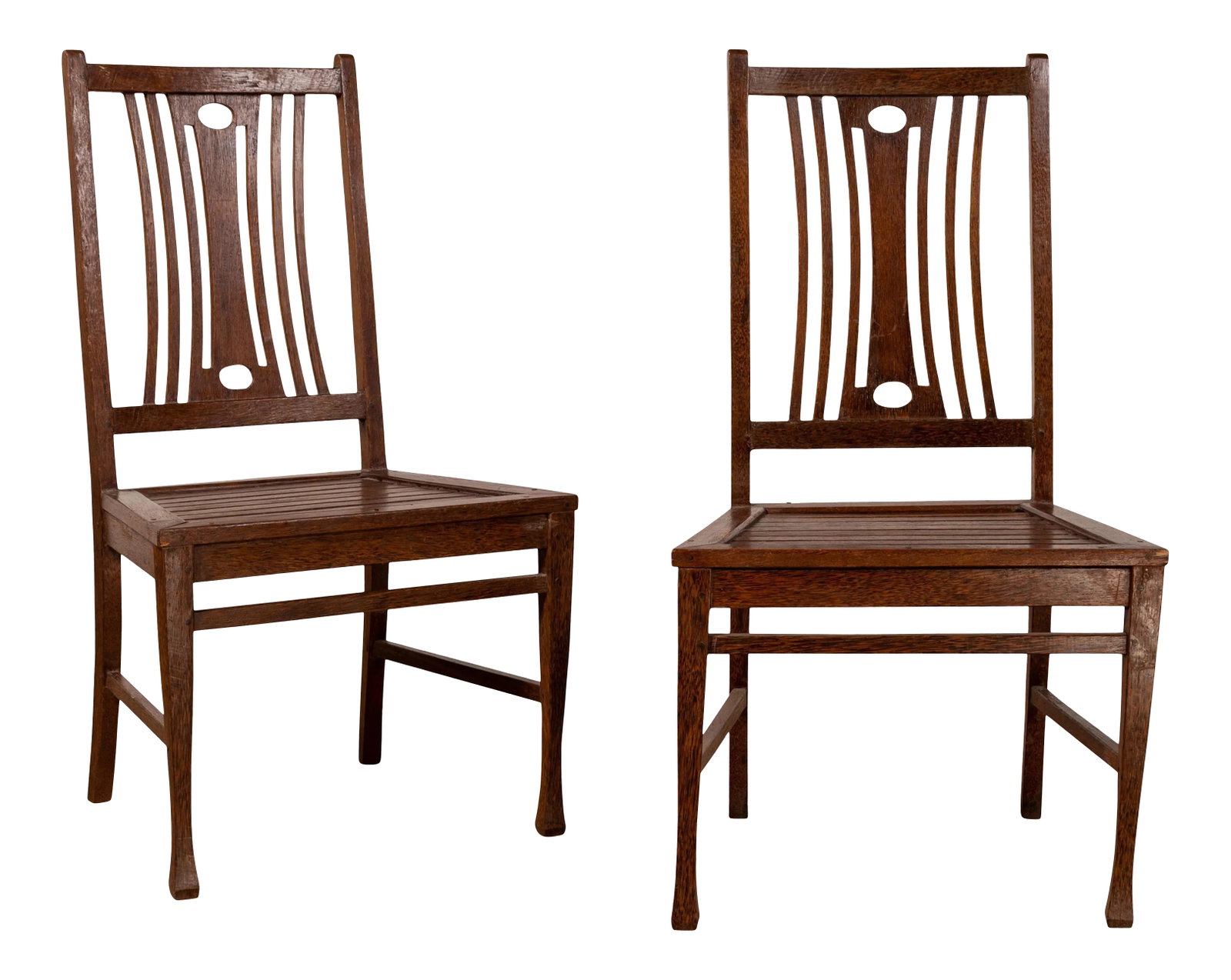 Midcentury Wooden Vintage Indonesian Side Chairs with Pierced Splats - A Pair: A pair of vintage Indonesian wooden side chairs from the mid-20th century, with pierced splats. We currently have two or more pairs available, priced and sold per pair. Born in Indonesia during the
