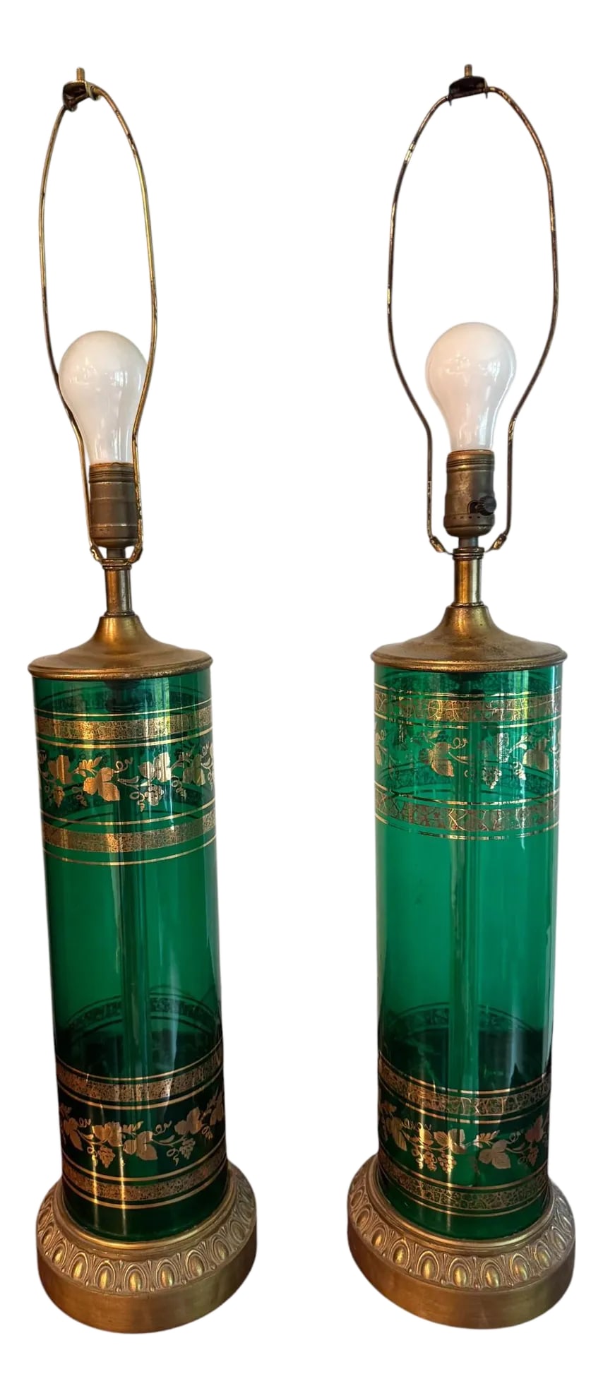 Mid 20th Century Berger Green and Brass Translucent Lamps - A Pair: Berger Mid Century Green and Brass Translucent Lamps - A Pair These two emerald green glass lamps are a fantastic Hollywood regency style accent to your space. The gold grape embellishments further en