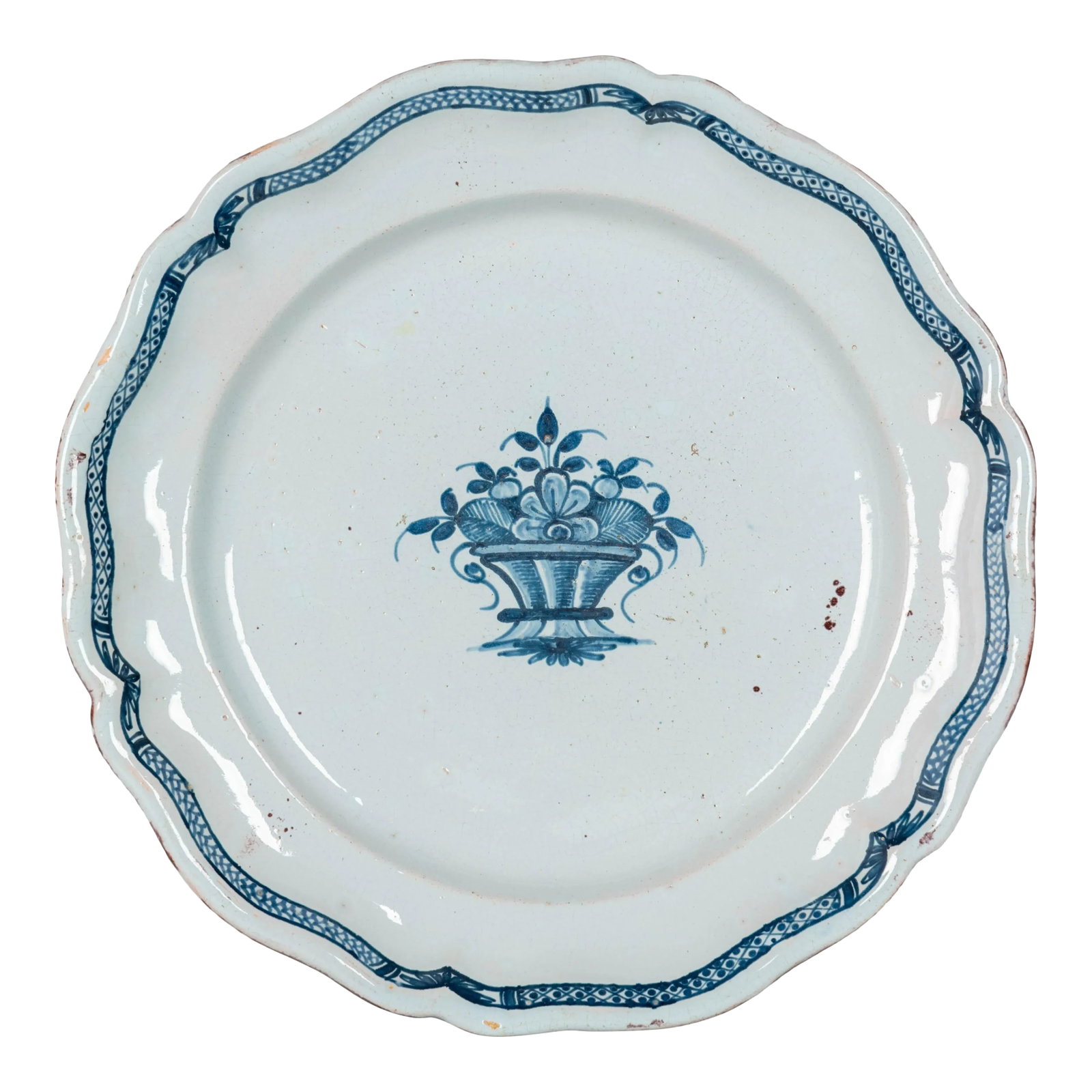 18th Century French Rouen Ceramic Platter: A large 18th century French Rouen white glazed cul noir earthenware platter with scalloped edge, hand-painted with blue decorative banded border and a fruit basket in the center. Robust heavy pottery 