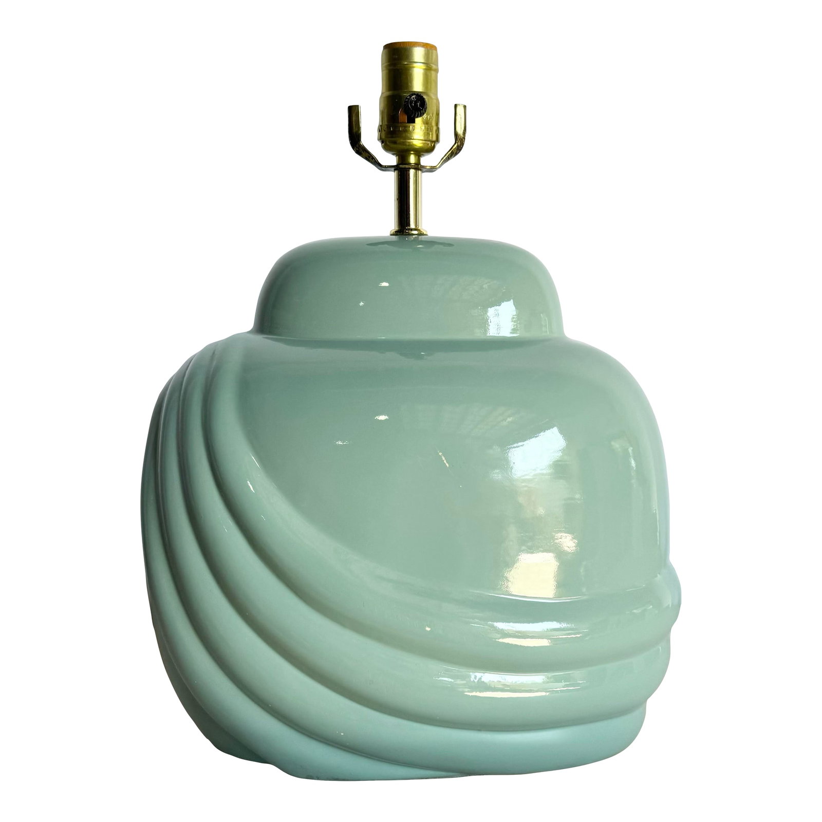 Postmodern Turquoise Scalloped Table Lamp: Soft curves and a bold sculptural form define this stunning postmodern table lamp. Finished in a glossy turquoise glaze, the swirling scalloped design gives it a fluid, organic feel. Its oversized cer