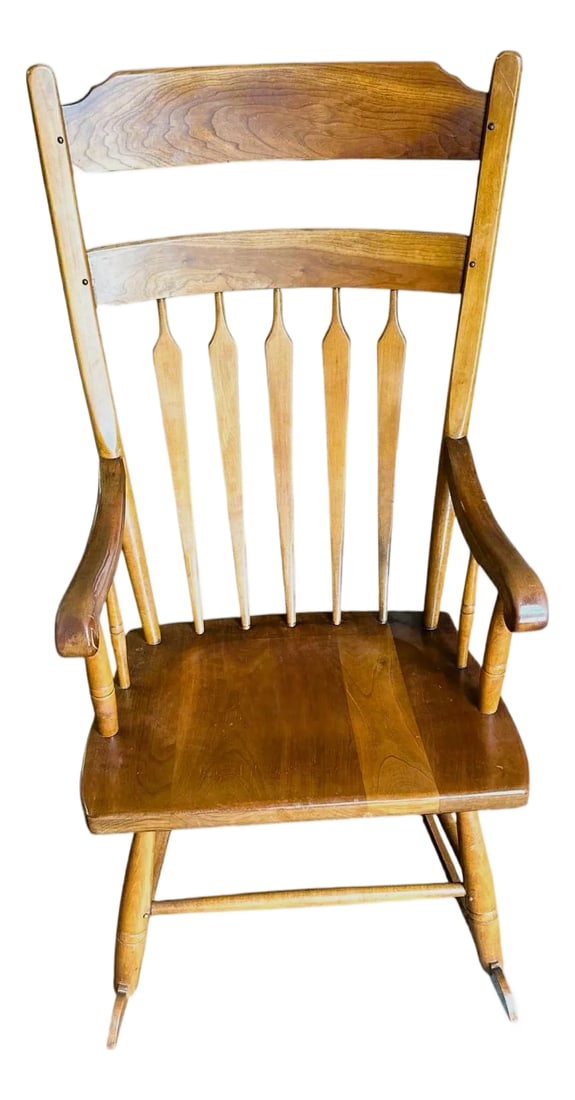 Stickley Cherry Wood Cattail Rocking Chair - Vintage Mid 20th Century Dated 1956: Sturdy and with a beautiful finish and grain, this Leopold Stickley rocking chair made in 1956 is a rare find. Only one small nick on one of the arms as shown in the pictures. Condition: Alterations: