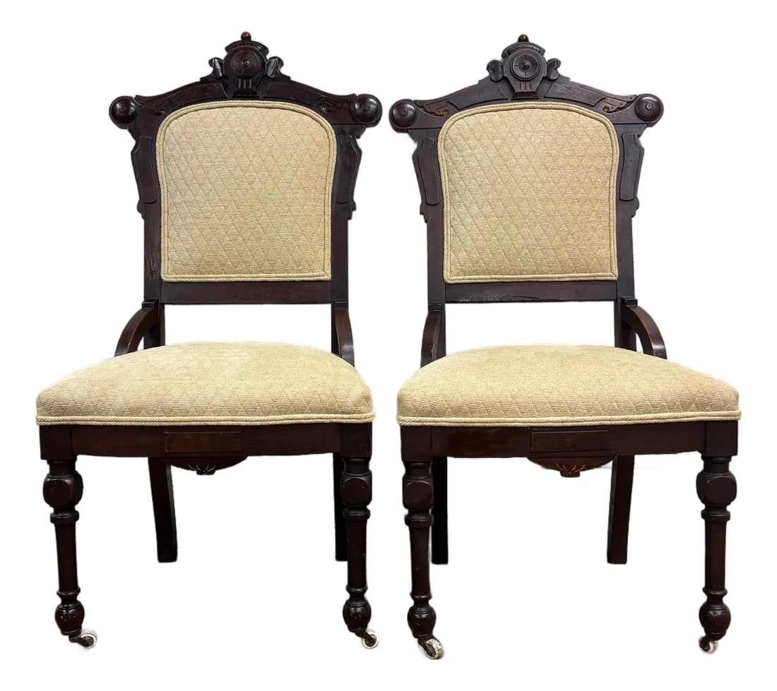 Antique Victorian Eastlake Style Carved Parlor Chairs Side Chairs - Pair: This is an absolutely stunning pair of antique Victorian Eastlake style carved parlor chairs or side chairs. They feature beautifully turned legs, stunning carvings throughout, and cream, diamond upho