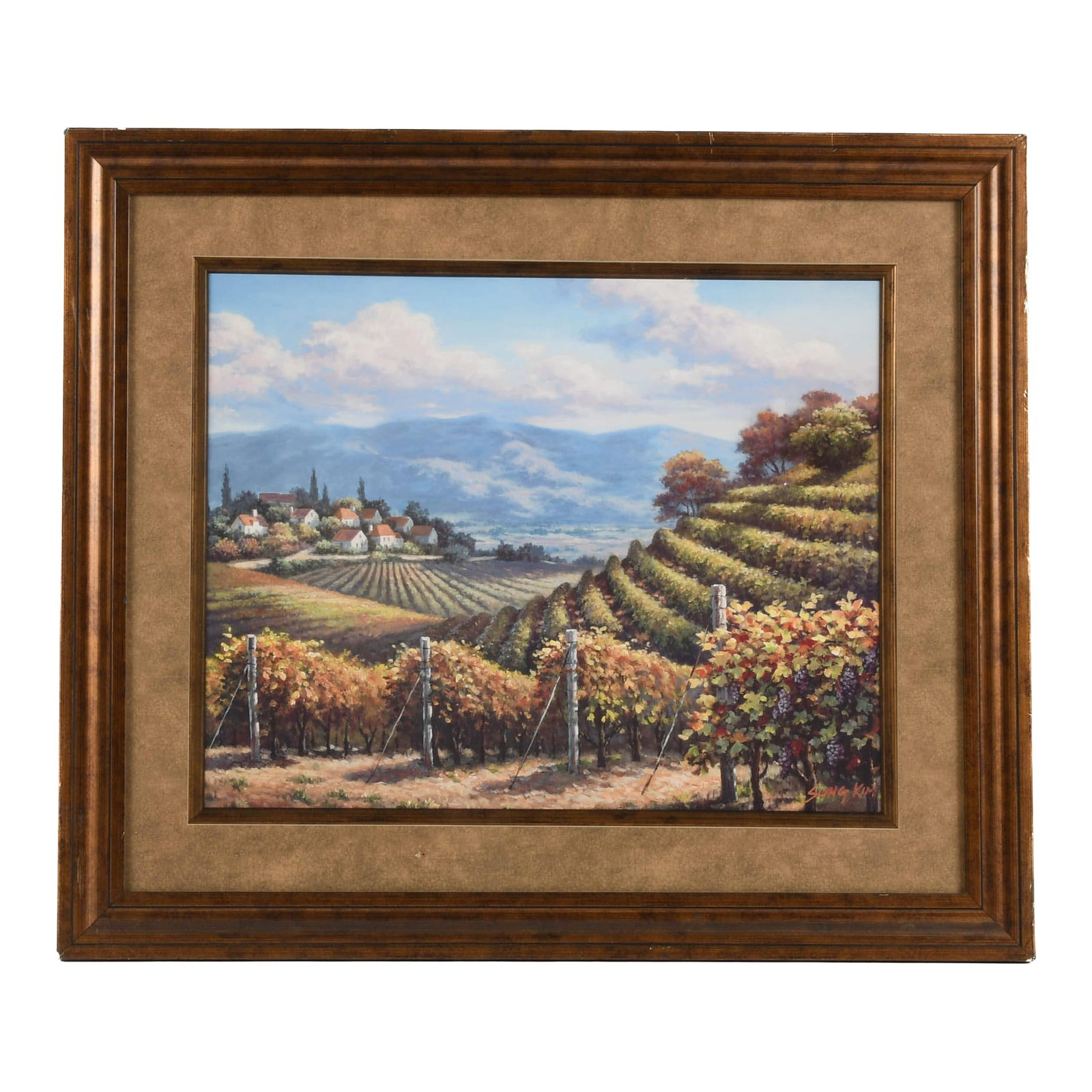 Framed Signed Sung Kim Vineyard Village Print: This Framed Signed Sung Kim Vineyard Village Print captures a picturesque vineyard landscape bathed in warm sunlight, showcasing the gentle slopes and meticulously aligned rows of grapevine in rich, a