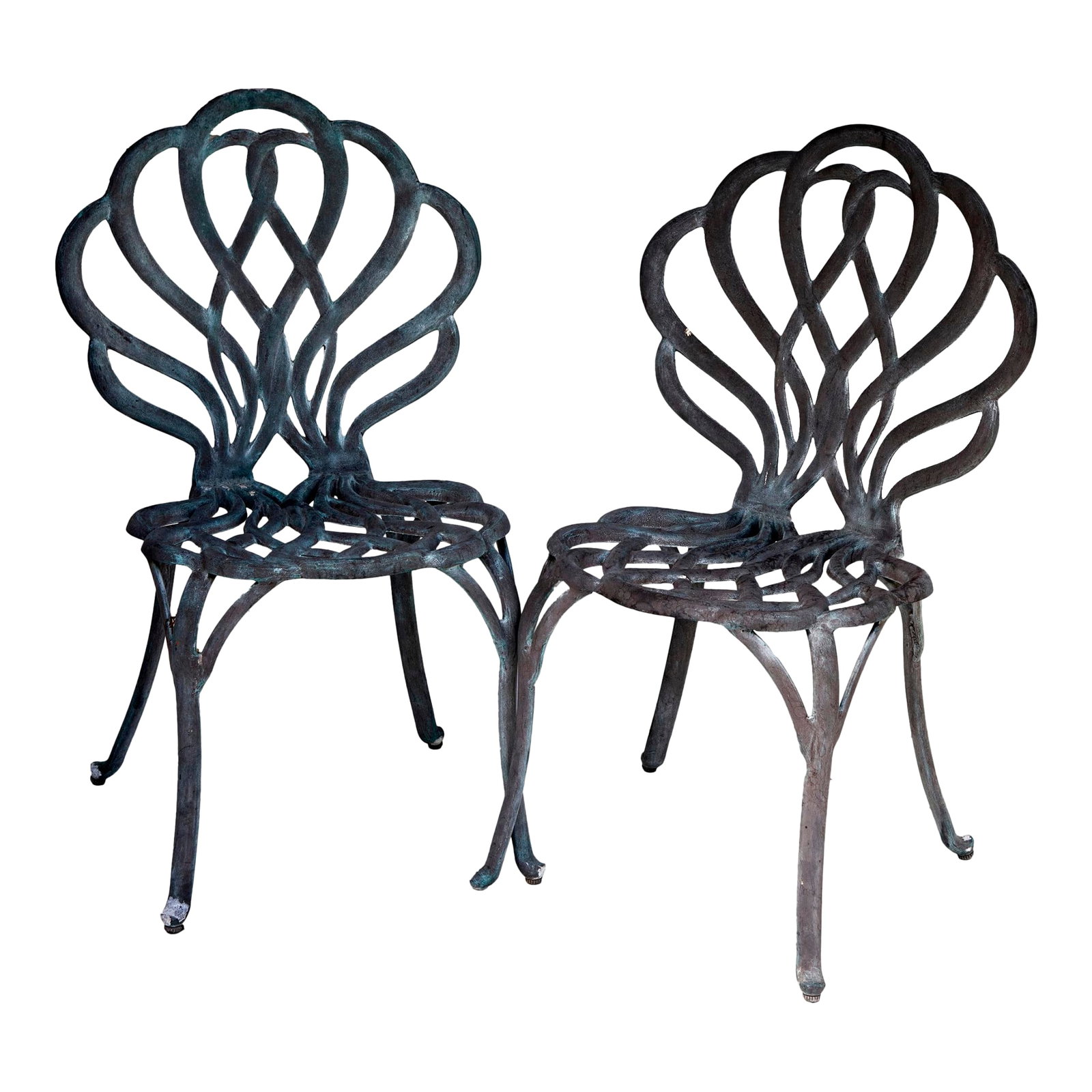 Pair of Vintage Cast Iron Garden Chairs: An Unusual Pair of Vintage Cast Iron Garden Chairs in Ribbon Design. They are in Original Condition and have a beautiful patina in copper green, which looks beautiful up against greenery in the