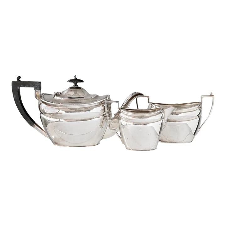 1930s Art Deco English Silverplate Cream & Sugar Set: Don't settle for boring mugs when you can sip from a work of Art Deco elegance. This three-piece silver-plated tea set by Boardman & Glossop (Sheffield, c.1930s-40s) brings angular lines, ebonized han