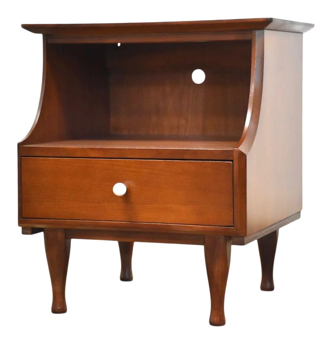 Kipp Stewart Style Walnut Nightstand: A mid century modern walnut nightstand that has a similar white porcelain knob to the designs of Kipp Stewart and Stewart MacDougall for Drexel. 22" wide. 17.5" deep. 24" tall. Condition: Alterations: