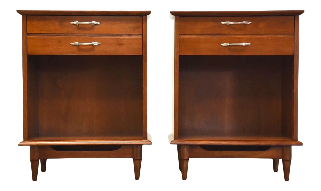 Lane Walnut Mid-Century Modern Nightstands- a Pair: A pair of walnut mid century modern nightstands with chrome drawer pulls by Lane. Professionally refinished. 22" wide. 15" deep. 28.25" tall. Condition: Alterations: Restored Imperfections: Some Imper