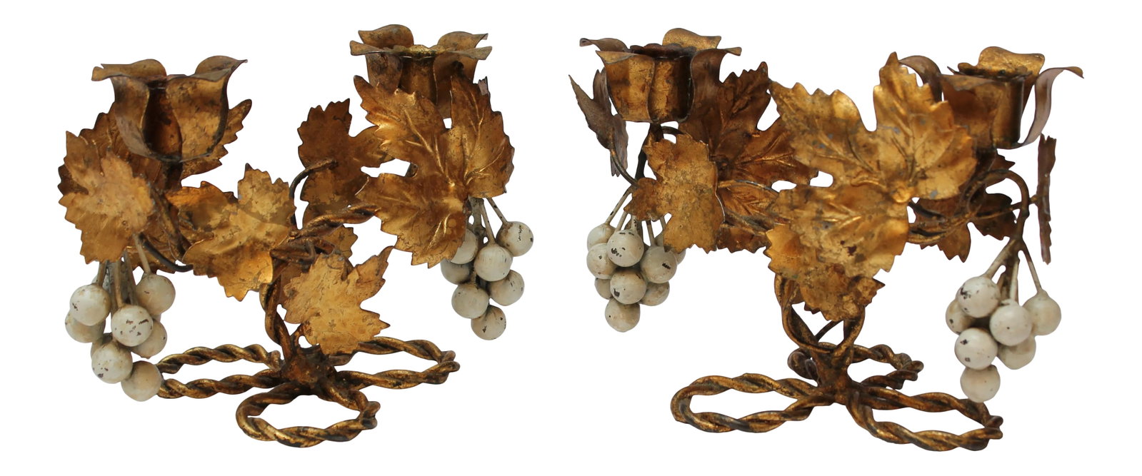 Pair of Vintage Italian Gilt Tole Florentine Grapeleaf Candleabra: Pair of striking circa 1970s Italian candleholders in gilt tole with grapeleaf and grape motif. Each sconce holds two candles. Nice patina / age-appropriate wear to the gilt. Height: 5.5 in. Width: 8 