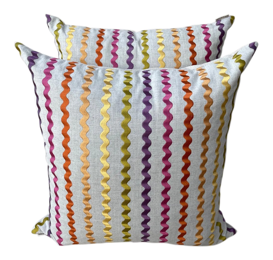D.V.Kap Home "Samba Blossom" Rainbow Stripe Throw Pillows- a Pair: D.V. KAP Home "Samba Blossom" Rainbow Stripe Throw Pillow in a beige linen with rainbow ribbon on the front and solid on back. Feather filled. Used for staging and in perfect condition. A fun