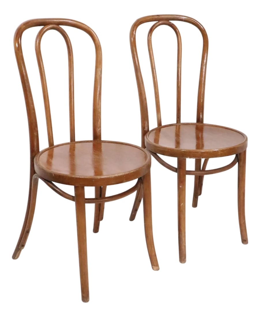 Early 20th Century Pr. Vienna Secessionist Bentwood Cafe Bistro Chairs by Thonet: Exceptional pair of Vienna Secessionist bentwood cafe, bistro, dining chairs marked Thonet. The chairs are in very good, original, clean and ready to use condition, showing only light cosmetic wear, n