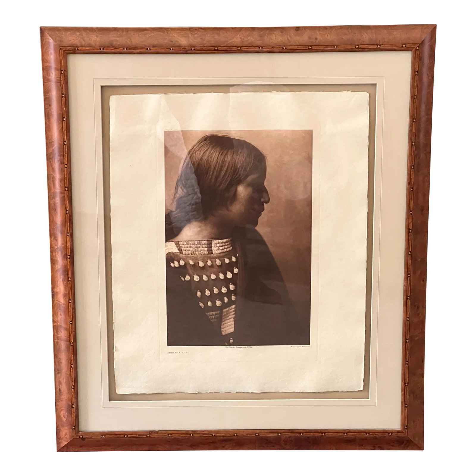 Framed Edward Curtis Arikara Girl C 1908 Christopher Cordozo: Original Edward Curtis photo, circa 1908, titled Arikara Girl. Plate 1165, photogravure by John Anderson and Son. Watermark on the reverse imprinted Van Gelder Holland. The photogravures are in sepia