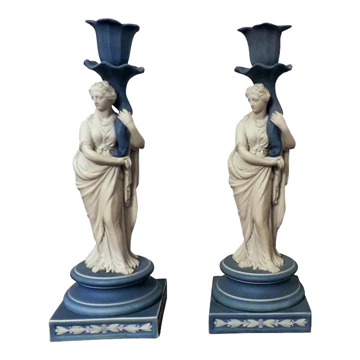 Early 19th Century Wedgwood Classical Jasperware Figural Candlesticks - a Pair: A fine pair of Wedgwood light blue jasperware candlesticks dating from the period 1800 - 1810. Each in the form of a classical maiden holding a cornucopia which becomes the candle nozzle. The figures 
