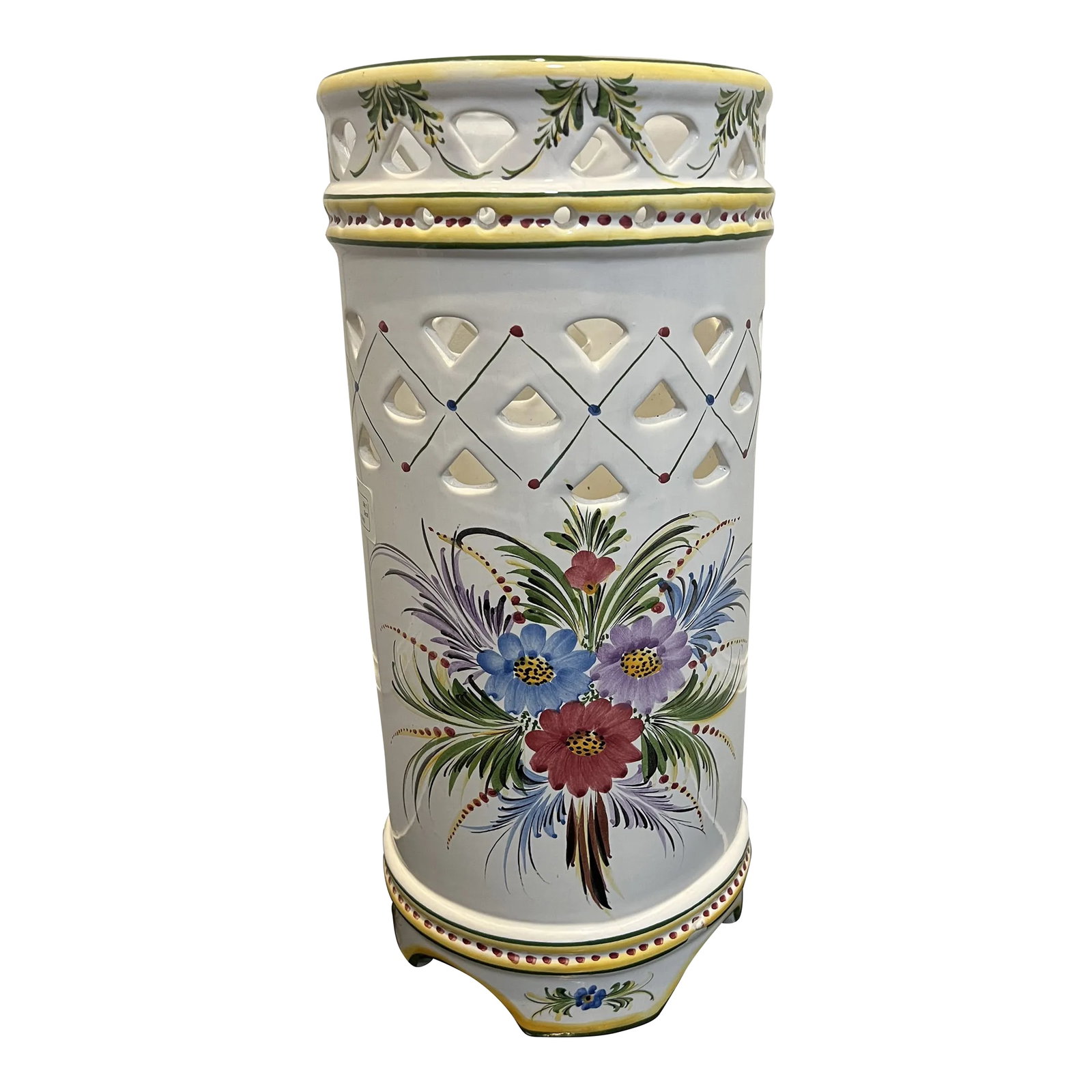 Hand Painted Umbrella Stand Made in Portugal: Lovely umbrella stand in bright colors with fretwork around the top and middle. Hand painted with flowers and a yellow and green border. Marked on the bottom Made in Portugal RC & CL Condition: Altera