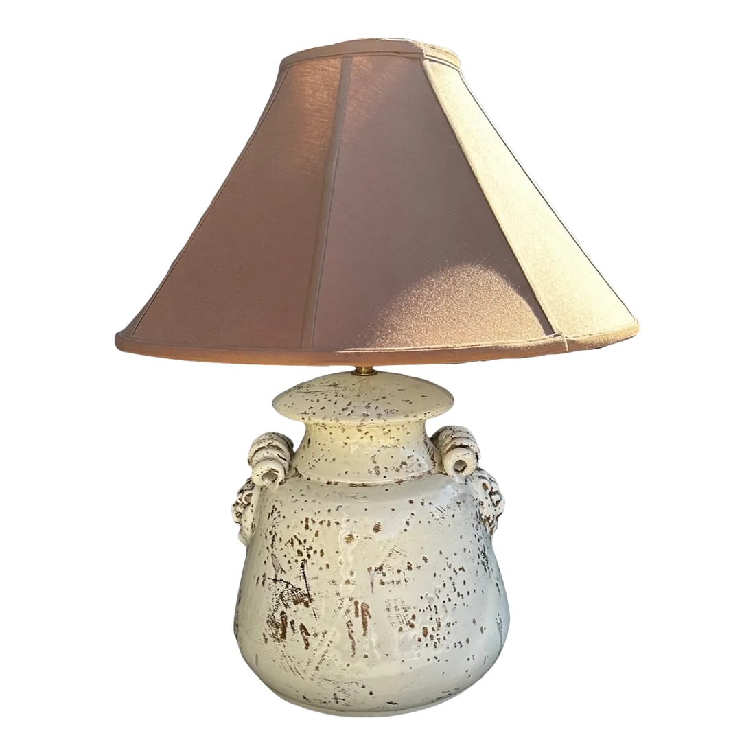 Rustic European Italian Glazed Terracotta Urn Table Lamp W/Shade: Rustic European Beige Glazed Terracotta Table Lamp Urn/Jug Table Lamp with brown shade. Pitted detail with lion heads and curly cue side detail. I would change the shade to a lighter color or even bla