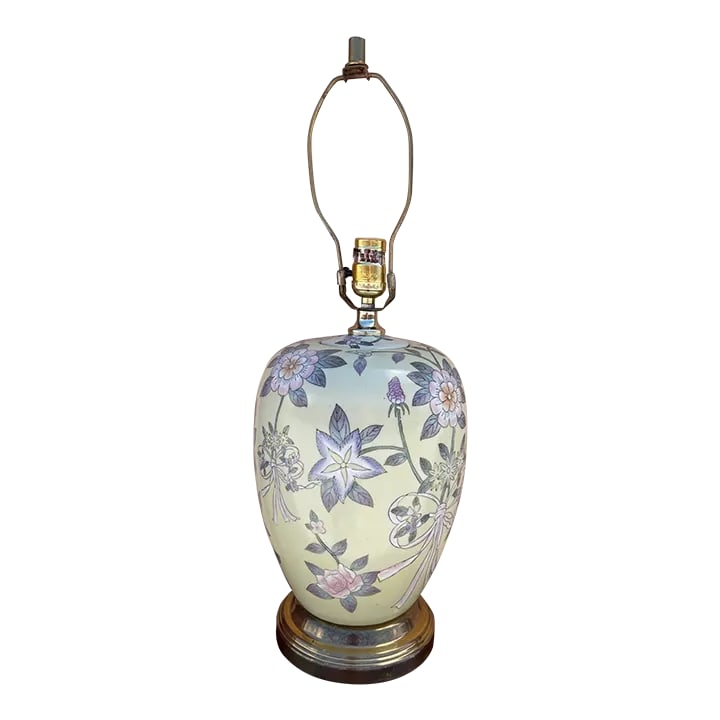 Vintage Floral Pastel Ginger Jar Table Lamp: Beautiful vintage floral ginger jar lamp with pastel yellow, pink, lavender and green throughout. Floral design with ribbon. Brass base. 16.5in h and 23in h to finial 6.5in base 8in width lamp Conditi