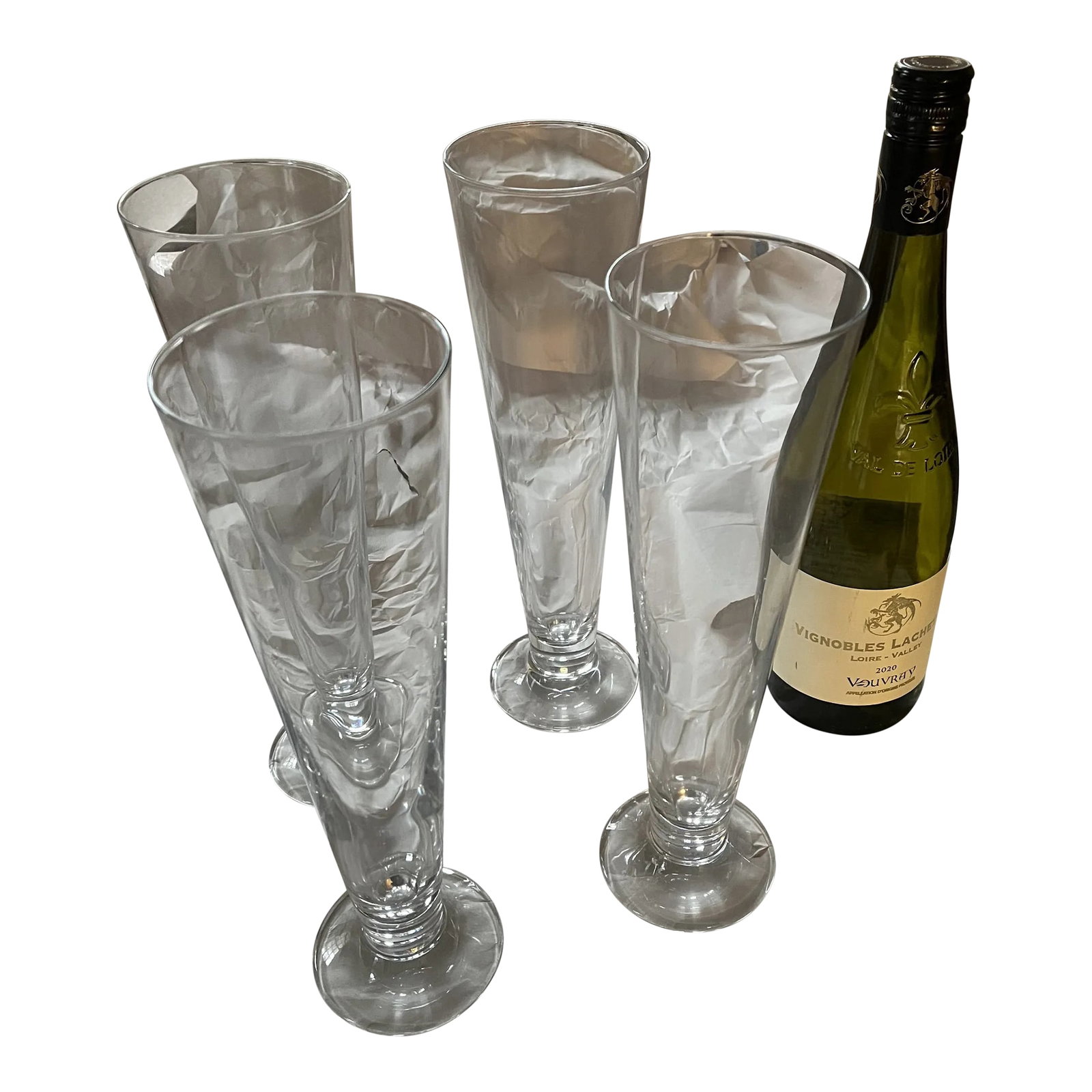 Vintage Pilsner Glasses- Set of 4: Set of exceptionally tall and slender tapered beer/Pilsner glasses (see wine bottle in photos for height reference). Condition: Alterations: Original Condition Unaltered Imperfections: Some Imperfecti