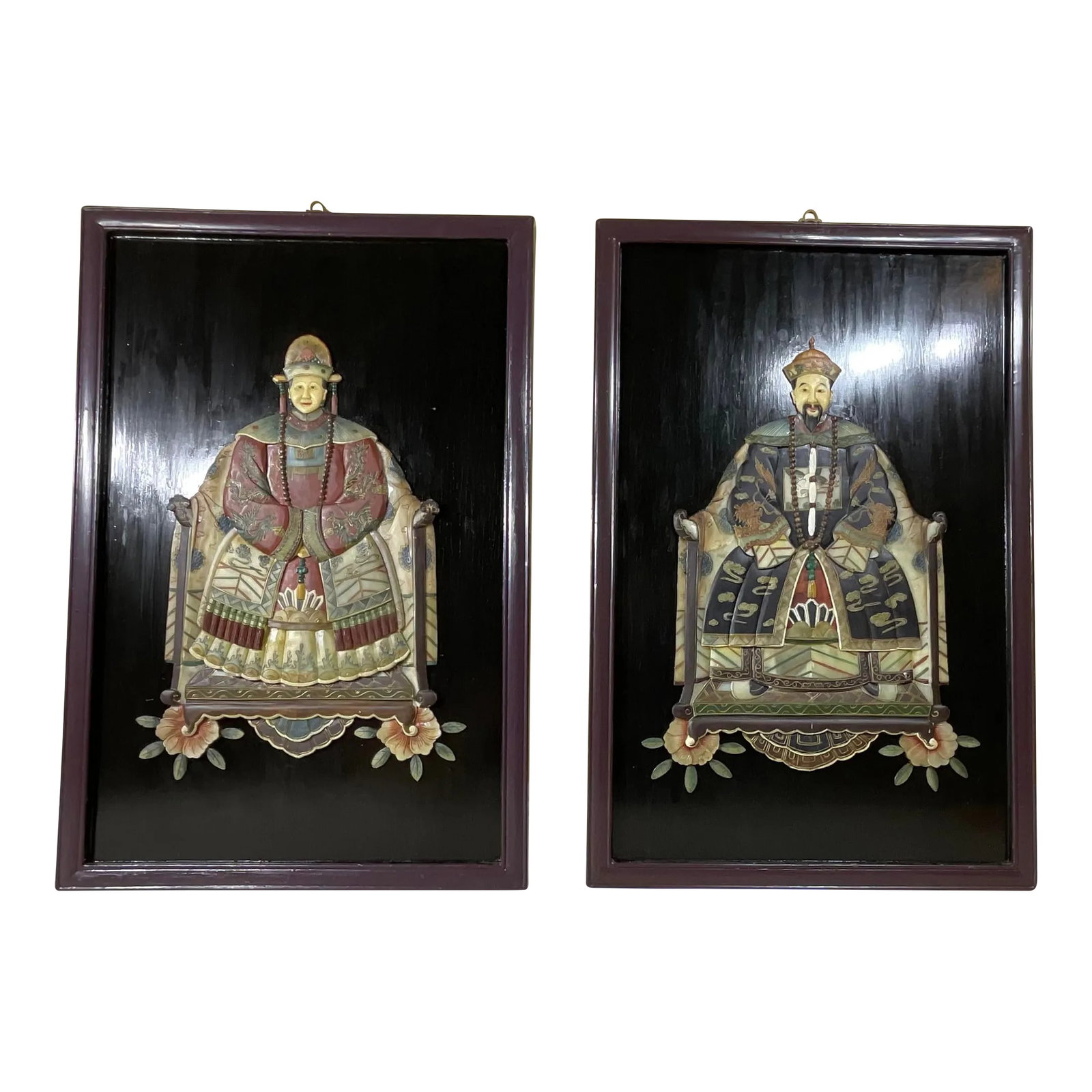 Pair of Large Chinese Carved Hardstone Emperor & Empress Portraits: multi dimensional hand carved and hand painted wall hanging Depicting a Chinese Dynasty Emperor and Empress. Vivid detailed stone carving of the two looking forward in grace Exceptional object of art