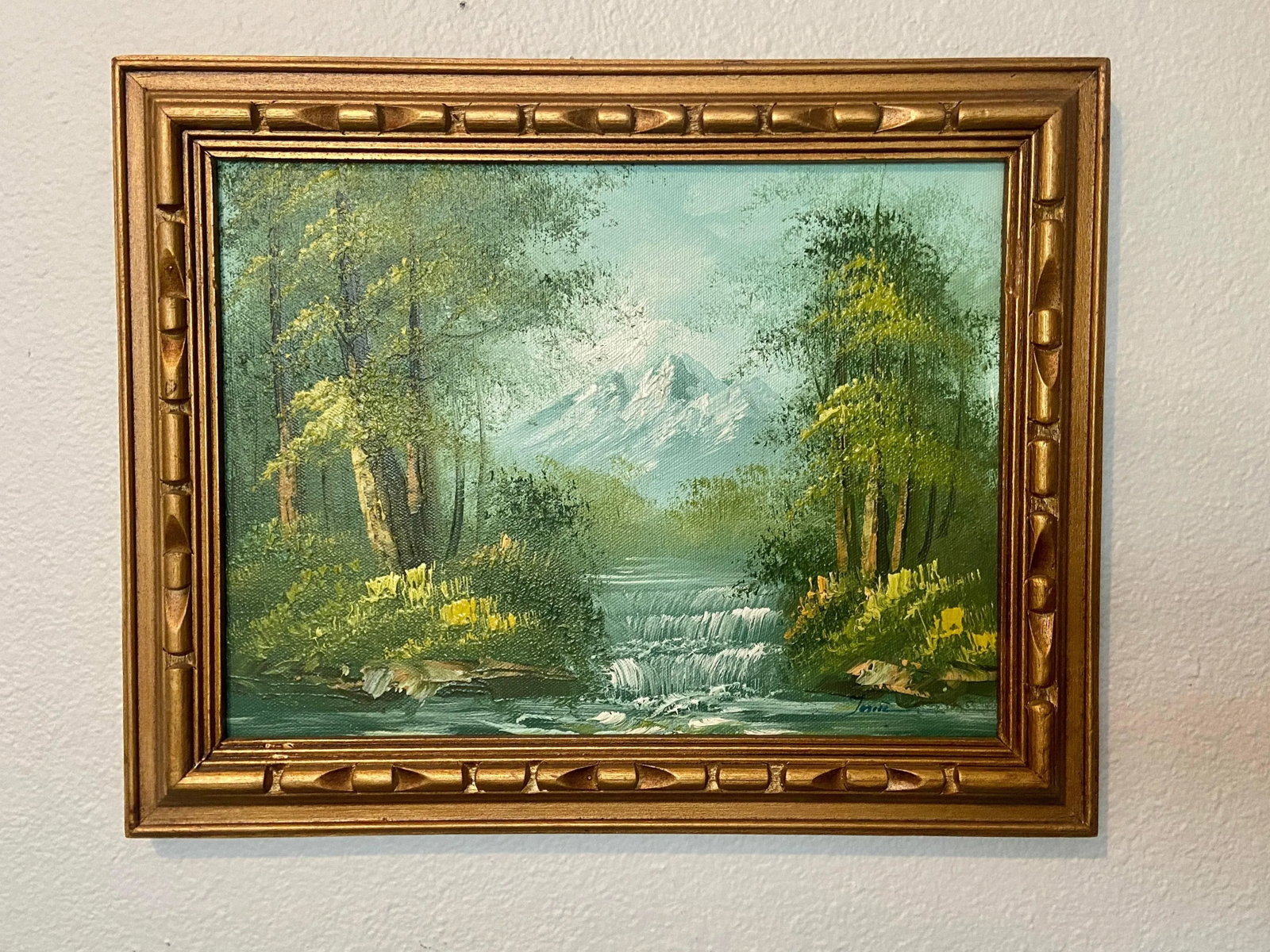 Original Vintage Oil Painting Mountainscape Stream Through the Woods: This is a vintage original oil painting of a beautiful mountain landscape with pines and a waterfall. 14.5 x 11.5" Canvas is 12 x 9 Condition: Alterations: Original Condition Unaltered Imperfections: