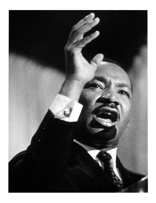 Dr. Martin Luther King Jr. 1967: Dr. Martin Luther King Jr. speaking at the World Affairs Council in Los Angeles, 1967. Photo by Ernest Reshovsky. 11" x 14" silver gelatin print. Signed on verso by Marc Reshovsky, the photographer's 