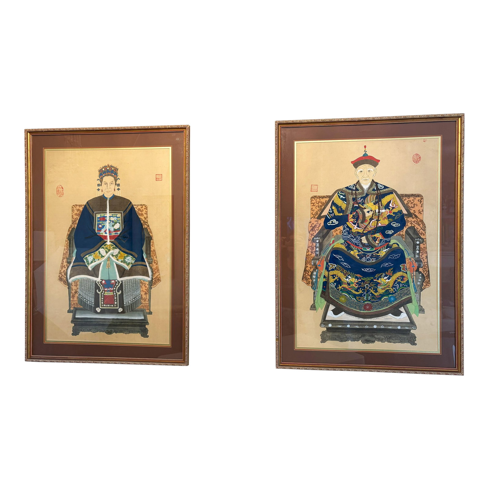 Mid 20th Century Framed Chinese Emperor and Empress Portraits Hand Painted on Silk- A Pair: Beautiful pair of intricately hand painted Chinese Emperor and Empress portraits from the mid 20th century. The medium is likely watercolor or gouache on silk. The portraits depict a Chinese Emperor a
