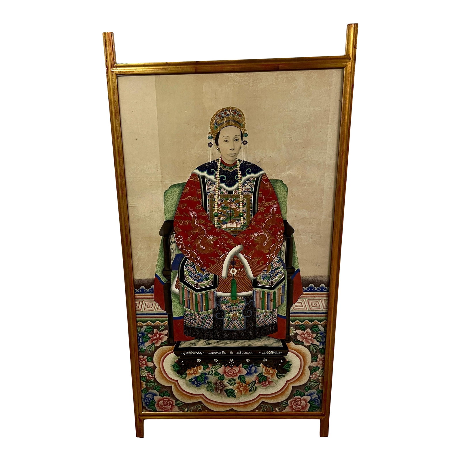 Ancestor Portrait Framed in Gold Leafed Frame: A beautiful Ancestor portrait of an important Chinese Matriarch. The piece is hand painted in vibrant colors and has held the test of time. The gilt wood framing is an unusual frame that exceeds the
