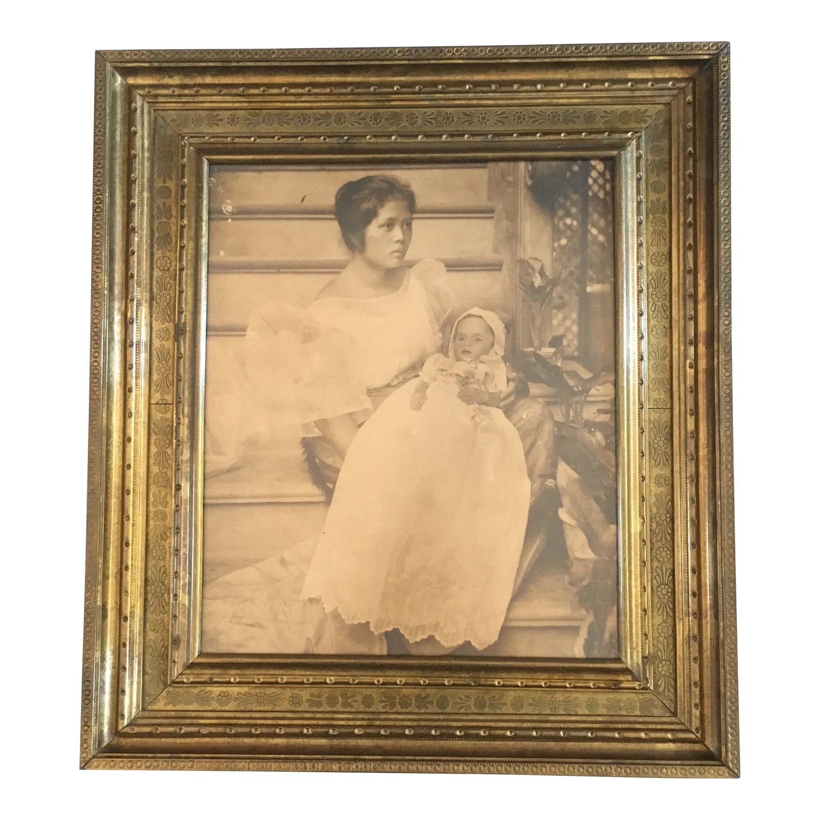 Victorian Large Brass Frame With Mourning Photo: Excellent example of a very decorative brass clad Victorian frame with a photograph of what I believe to be of a young woman holding her deceased infant known as a "mourning portrait" very common in t