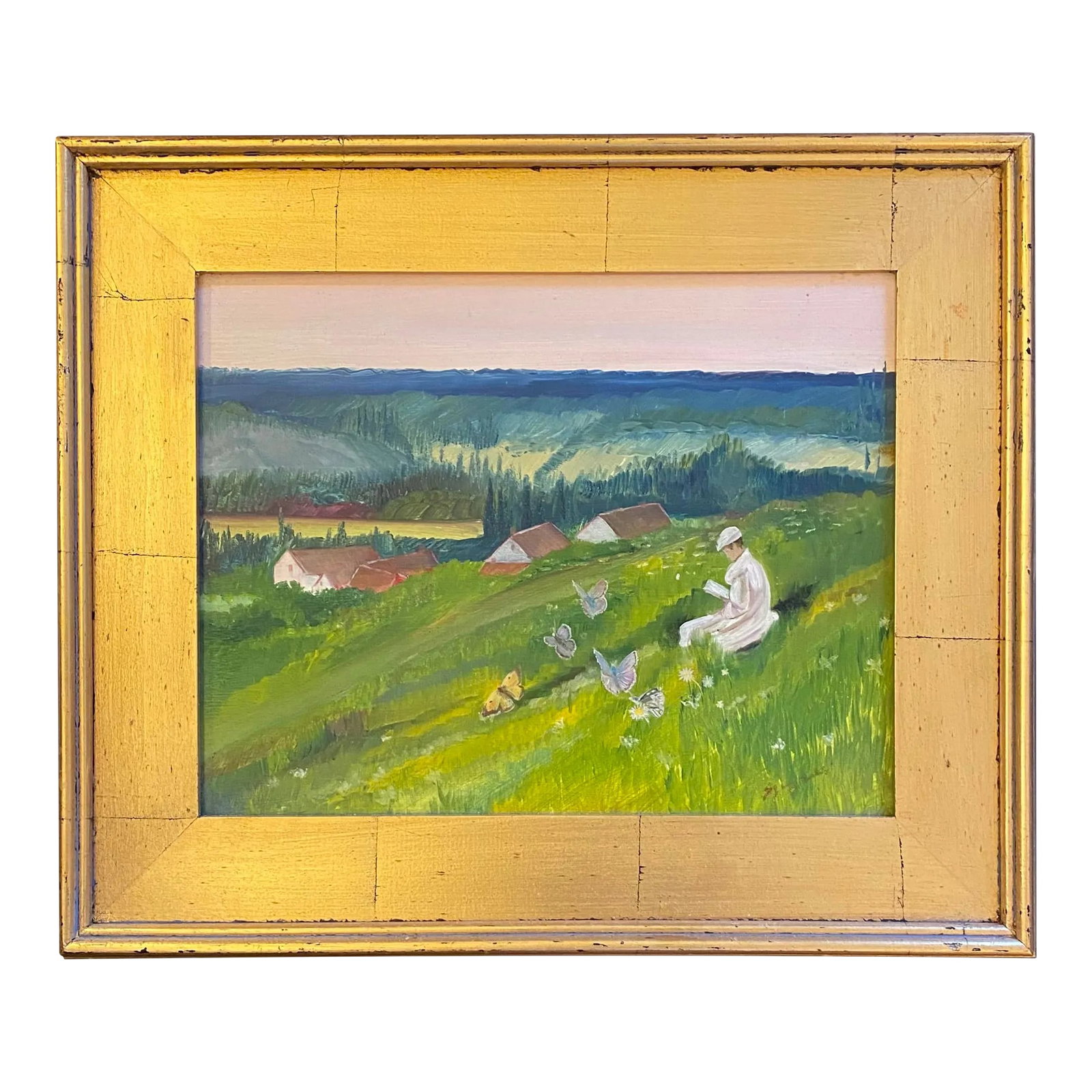 1990s Young Woman Reading a Book on a Hillside, Framed: Oil painting on Masonite of a young woman sitting on a hillside reading a book, surrounded by butterflies and overlooking a village below by Satori Gregorakis. Signed in the lower right corner.