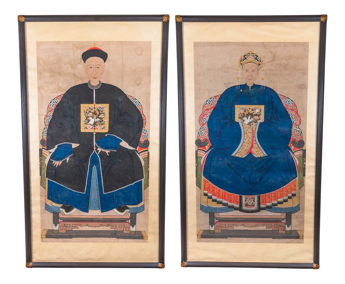 19th Century Ming Dynasty Chinese Ancestral Paintings, Framed - a Pair: A pair of 19th Century Ming Dynasty Chinese Ancestral Paintings, featuring seated man and wife. Each painting measures 40" H x 22.5" W, accents via black frame with gold leaf hand carved corners.