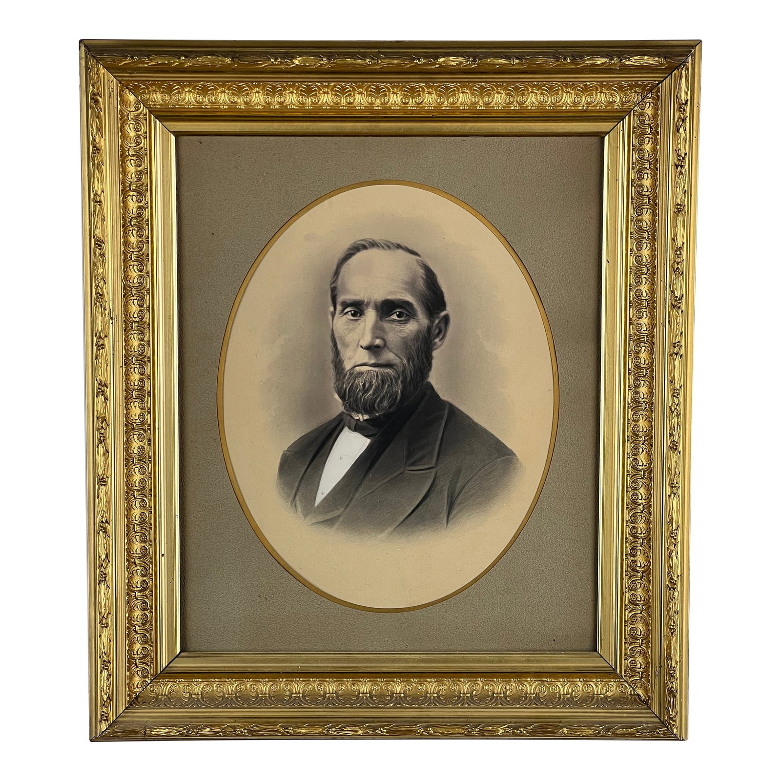 Antique Civil War Era Portrait of a Gentleman in Gilt Wood Frame: This striking Civil War-era portrait captures the dignified presence of a 19th-century gentleman, rendered in the classic sepia-toned style popular during the mid-1800s. The sitter's expression, cloth
