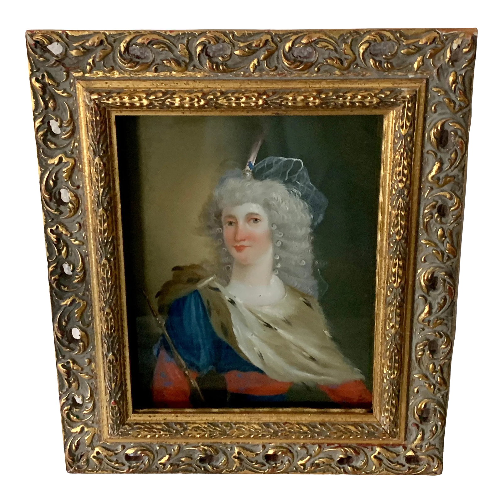 18th Century Reverse Painted Image on Glass: A wonderful reverse painted glass image. The image of a 17th C. female is wonderfully done and in very nice colors. The Frame is gilt and the image sits back, creating a shadow affect. Truly a