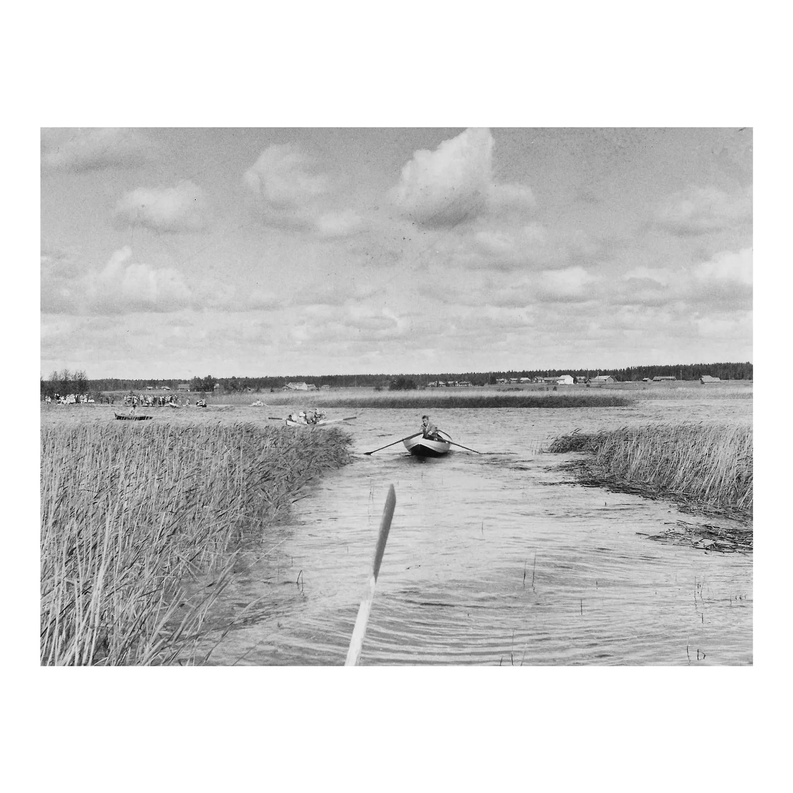 1960 Finnish Waterway Coastal Landscape Photograph: 1960 photo of people in Finland rowing to church. Publication information on the back. Combined shipping available, please inquire. Shipping times are significantly shorter than Chairish estimates.