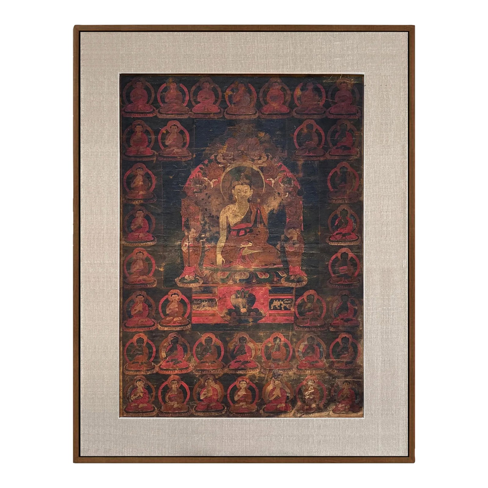 17th Century Tibetan Thangka Painting: An incredible and rare 17th century (Ming Dynasty) Tibetan Thangka depicting the Medicine Buddha seated on a lotus throne with an alms bowl in one hand, and his other hand with outstretched fingers