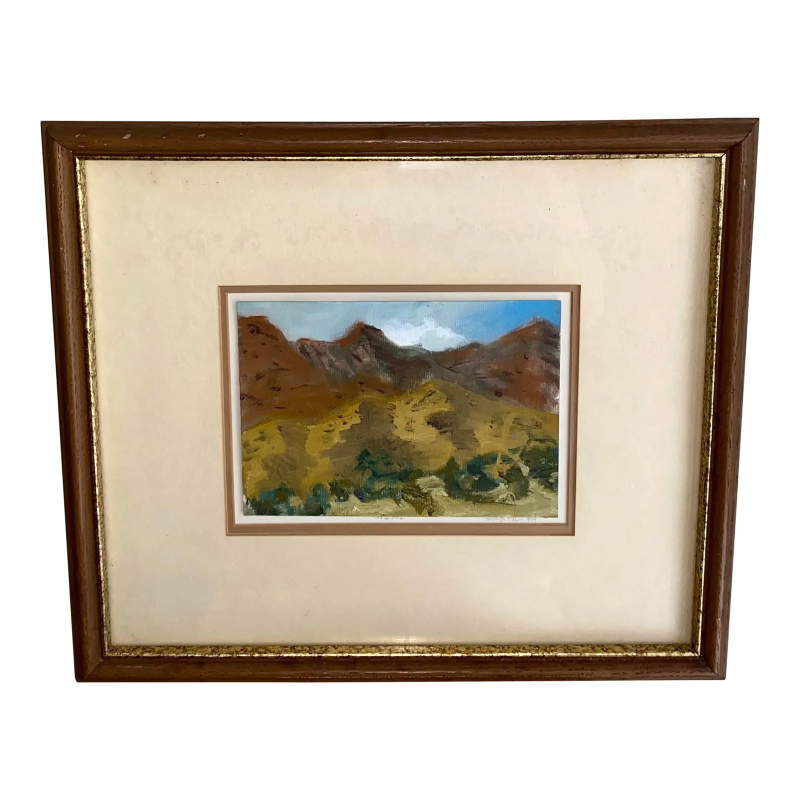 Vintage Western Oil Painting of Sandia Mountains New Mexico by Shelley Hull: Lovely little painting of the Sandia Mountains, spanning Arizona and New Mexico by artist Shelley Hull. Oil on board measures 5" x 7". Matted and framed under glass in nice wood frame with gold liner.