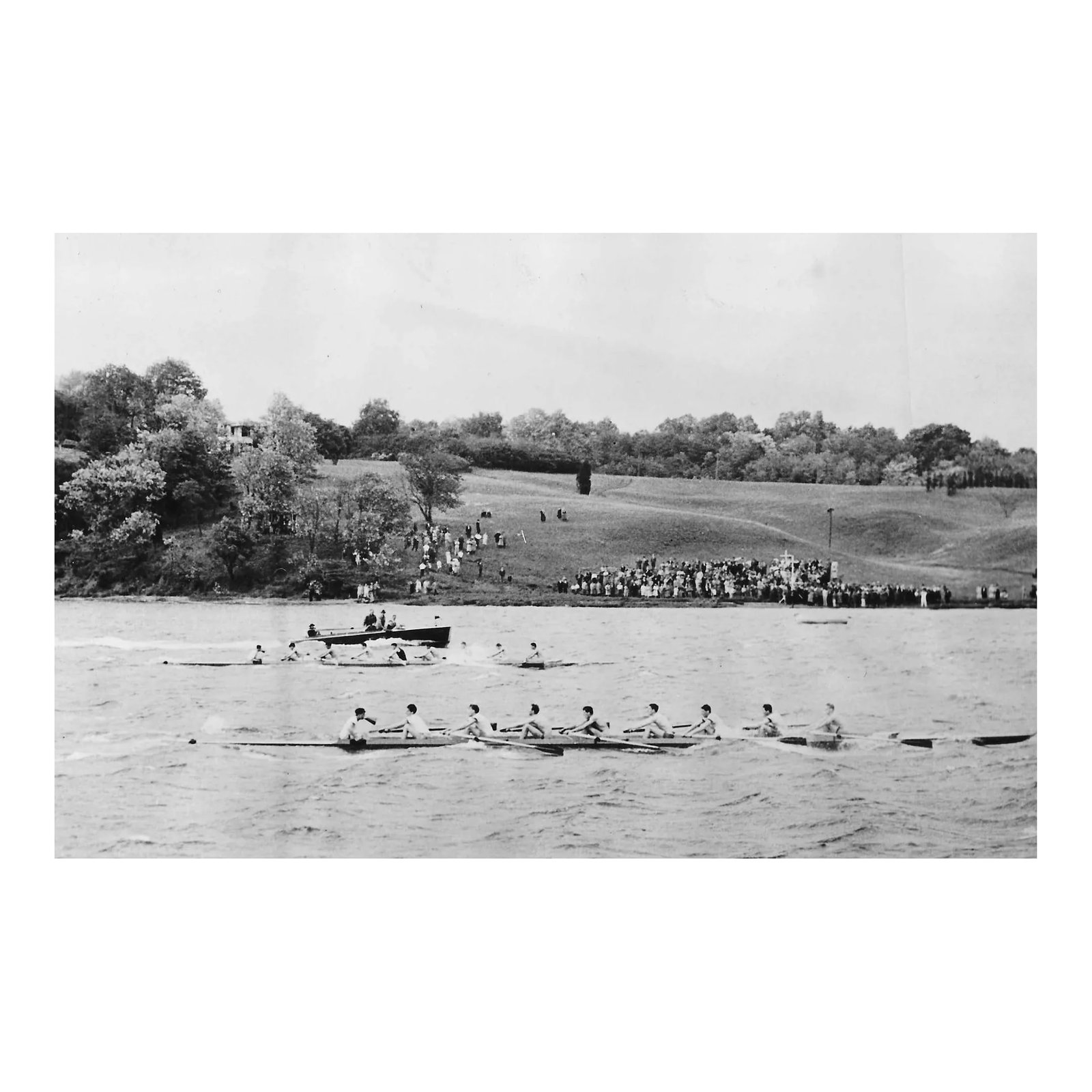 1941 Harvard and Navy Crew Adams Cup Race: 1941 black and white photo of Harvard University defeating the Naval Academy rowing in an Adam's Cup race on the Severn River near Annapolis. Publication information is adhered to the back.