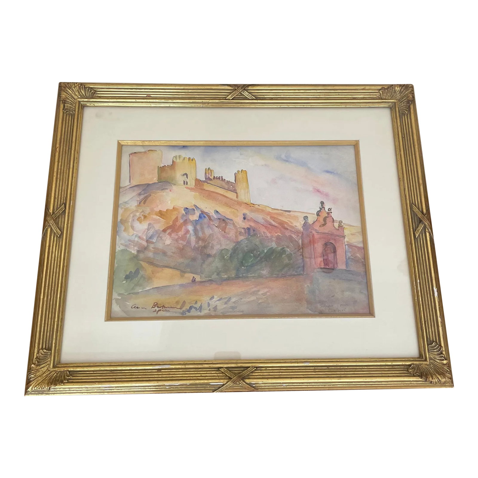 Framed Watercolor of Toledo Spain: This lovely water color is of a castle in Toledo Spain. It is a study of Castillo Almonacid beautifully rendered in 1925. It is framed with a silk mat and gold border inside a fantastic gold gilded