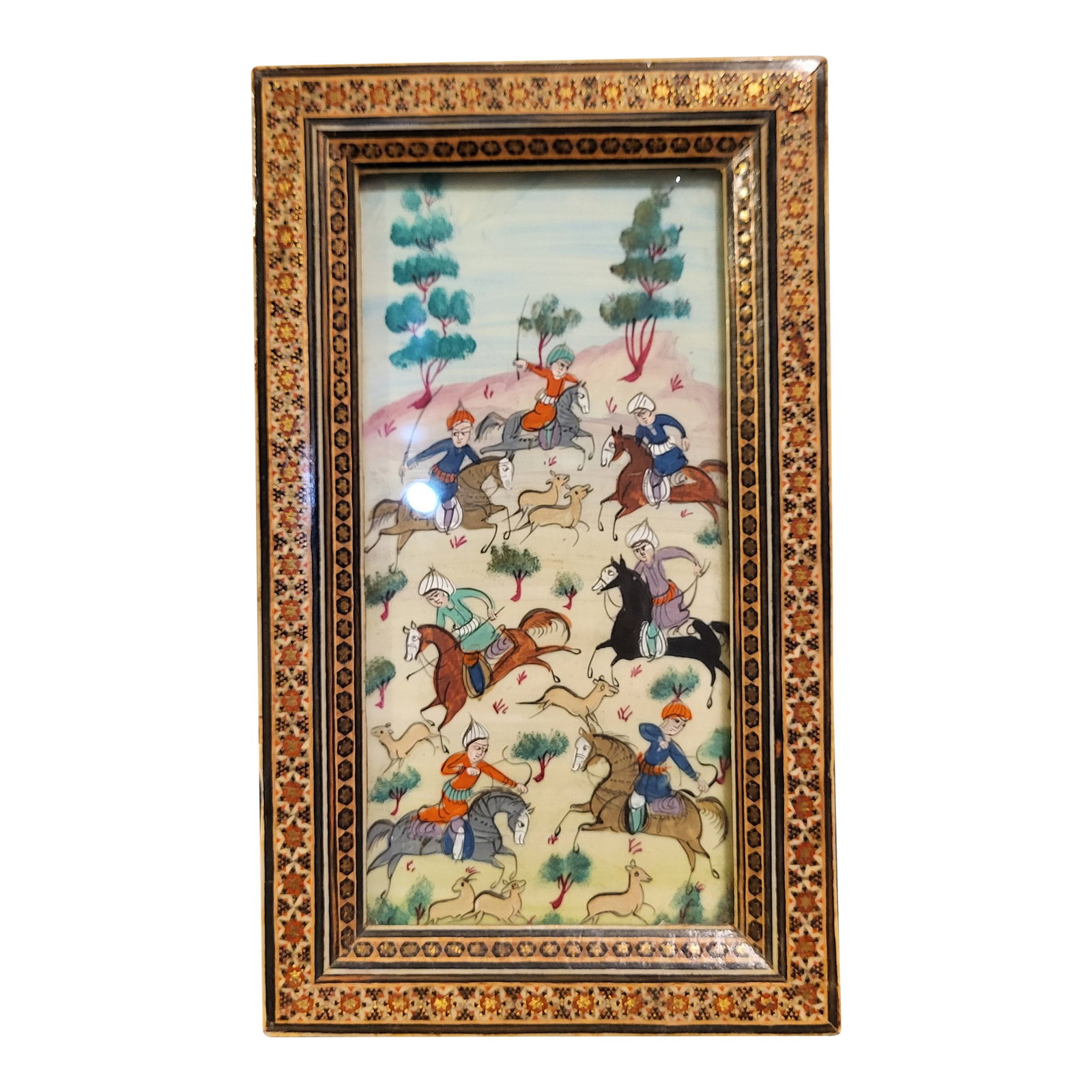 Framed Late 20th Century Persian Text and Illustration: Framed PersianGauche painted warriors on horseback riding swordsman and spearmen. Mounted in a gilt frame under glass and depicts a 20th century scene. Condition: Alterations: Original Condition