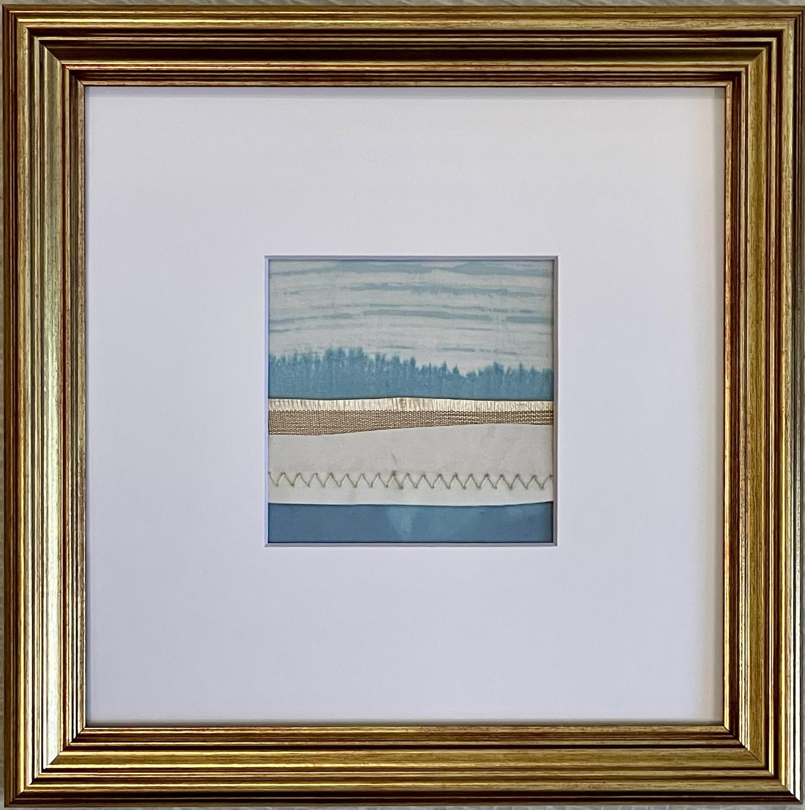 Contemporary Semi-Abstract Mixed Media Nautical Sailcloth Landscape - By JJ-Hogan | There Is Still: NAUTICAL SAILS + Reclaimed + Repurposed + Reimagined JJ Hogan repurposes retired nautical sails and marine cloths to create textural art under glass and on canvas. These works often incorporate