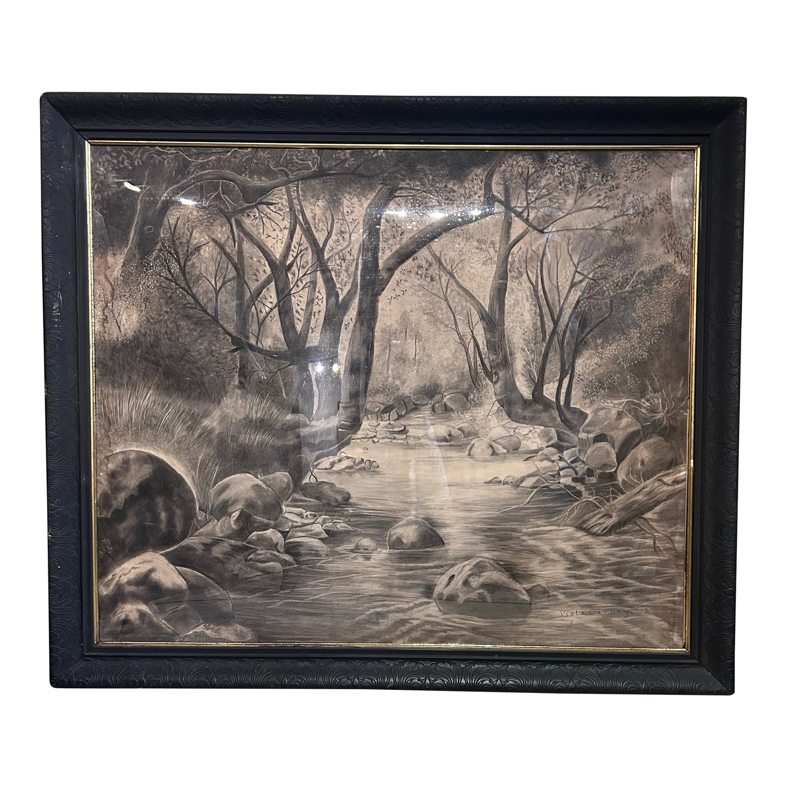 Monumental Antique Original Charcoal of Woodland Brook: Striking antique charcoal drawing by Viola Carney, dated 1913, framed in an enormous black carved wood frame with gilt inner edge and acrylic covering. Condition: Alterations: Original Condition
