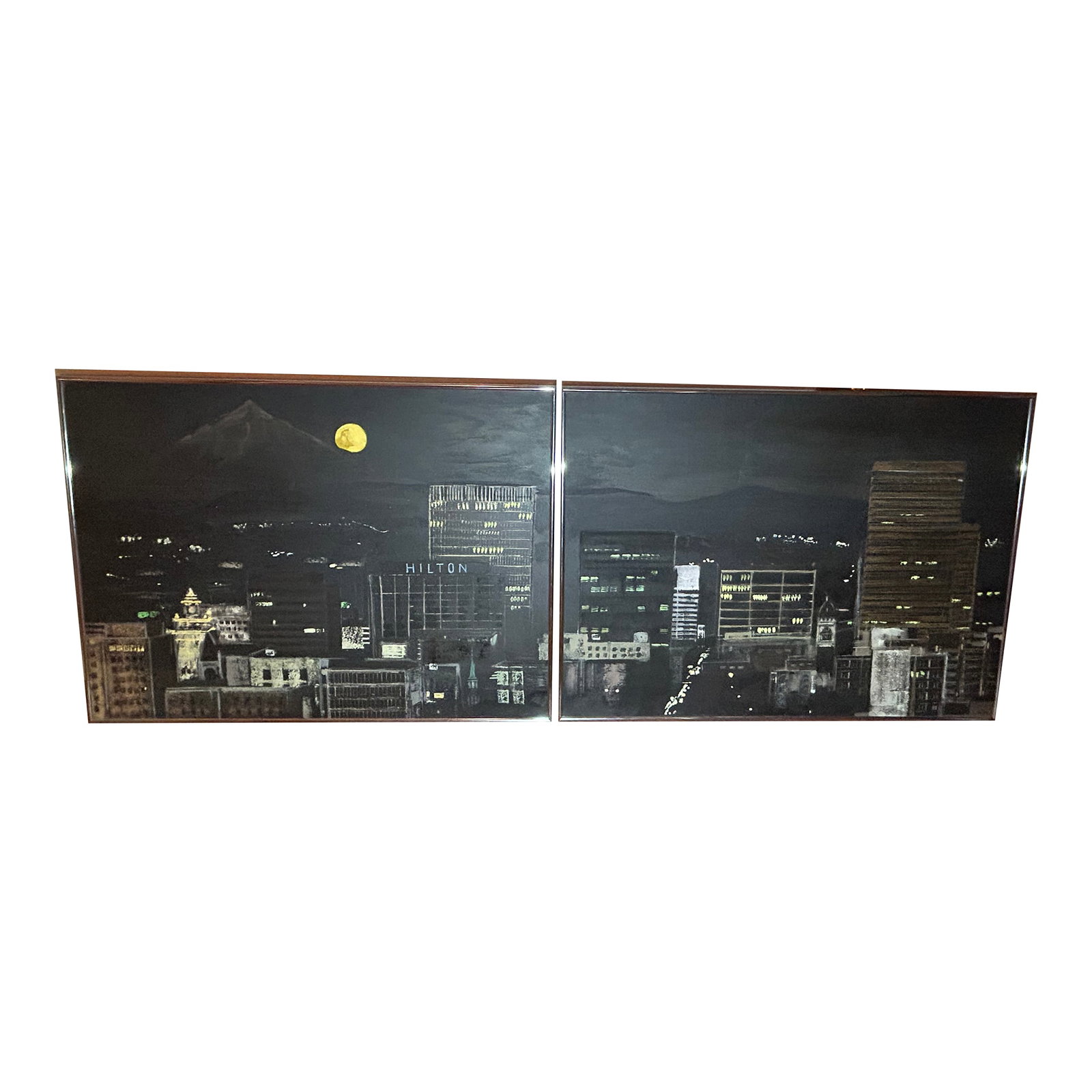 1980s Portland at Night Diptych, Framed- Set of 2: Sidonie Caron's "Portland At Night" is a unique rendering of Portland, Oregon's cityscape. She used a combination of watercolors and oils. It is framed in Anodized Aluminum in Pewter color.