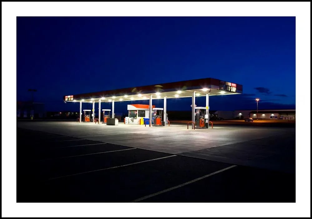 Lonely Gas Station - Photograph by George Diebold - Archival Museum Frame and 8 Ply Mat: LONELY GAS STATION - Alamogordo, New Mexico (C) George Diebold "Starting each day long before it's light has it's rewards, and this pre-dawn encounter confirms that. Leaving Alamogordo, New Mexico