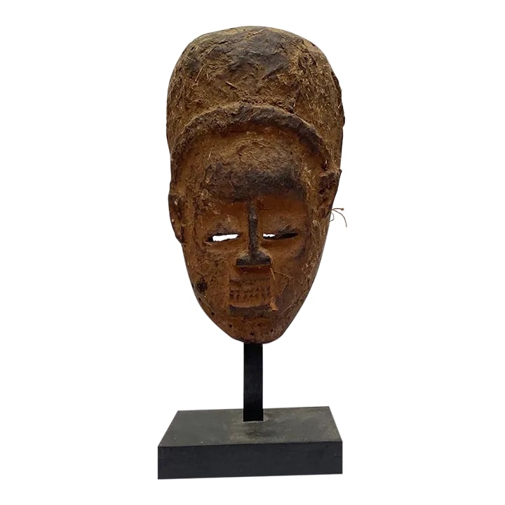 Mid 19th Century Urhobo Tribe, Nigeria African Antique Mask: Urhobo Tribe, Nigeria African Antique Mask circa 1850 wood, dry clay 12.25 x 6.75 x 3 in. Condition: Alterations: Original Condition Unaltered Imperfections: Some Imperfections Condition Notes: very g