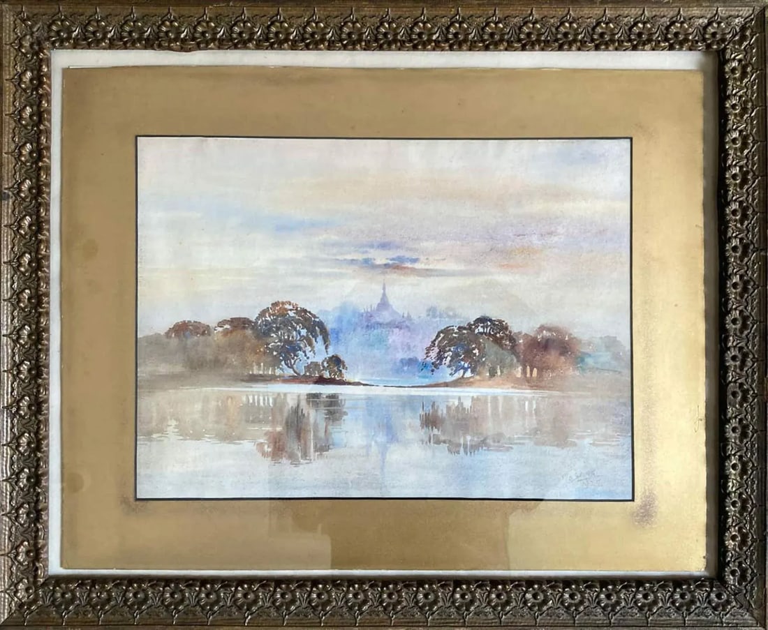 "Lake Scene" - Early 20th Century Watercolor Seascape Painting by m.c. Laung, Framed: (I apologize for the reflections on the glass.) A lovely, gentle watercolor of a quiet lake with the fall trees reflected in the water. In the misty distance rises a cathedral above a town. Painted in